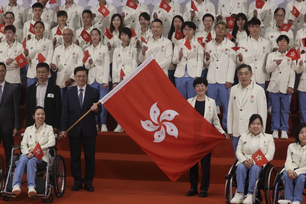 Hong Kong Chief Executive John Lee (left) and China Hong Kong Paralympic Committee President Jenny Fung (right), at the
Paris 2024 Paralympic Games flag presentation ceremony. Photo: Jonathan Wong