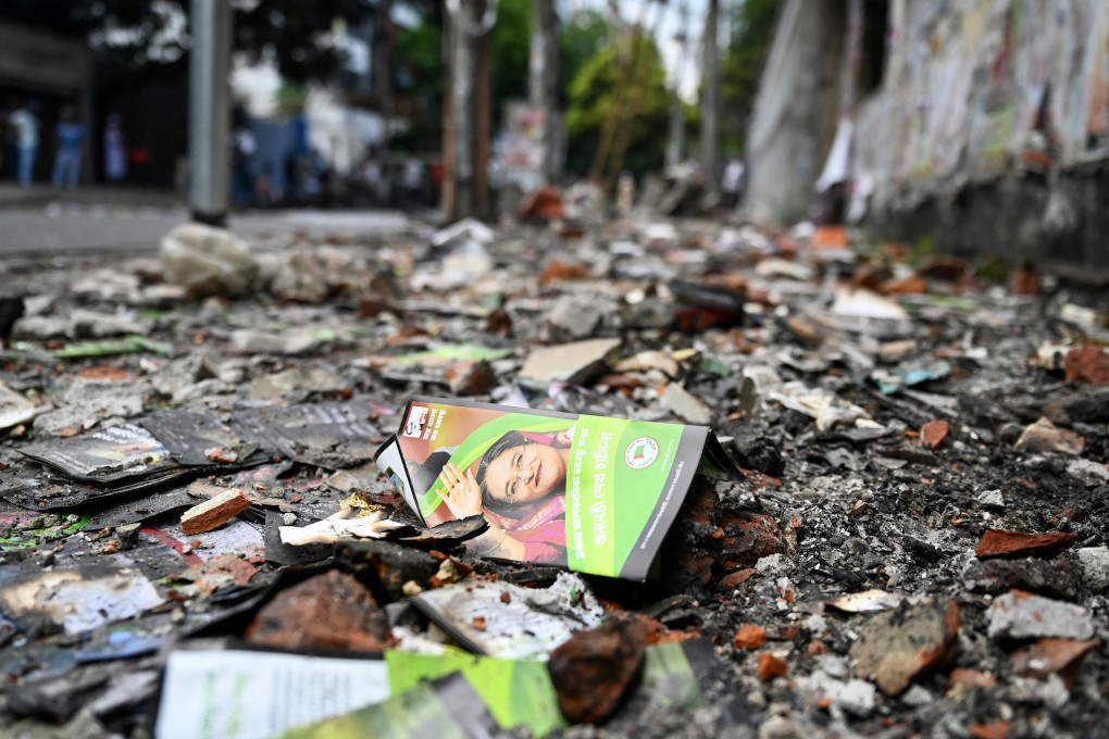 A burnt Awami League party office is pictured as anti-government protestors set fire in Dhaka on Tuesday, after former prime minister Sheikh Hasina fled the country. Photo: TNS