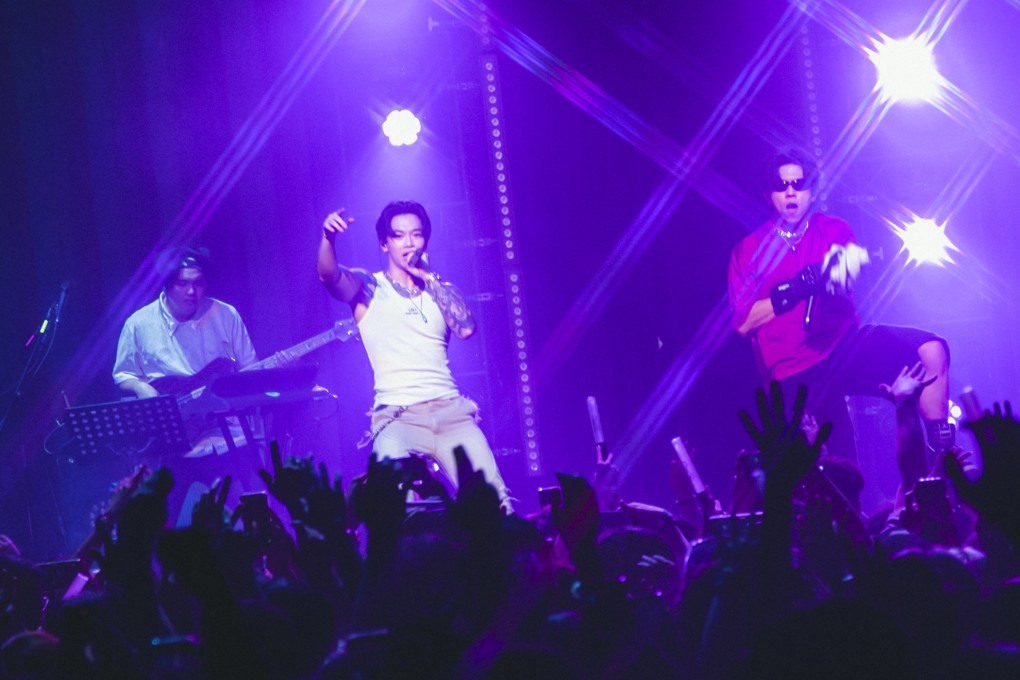 Taiwanese singer OSN (in white vest) during a concert at AXA Dreamland at Go Park Sai Sha in Ma On Shan, Hong Kong, on the weekend of July 27, 2024. The venue could become a platform for local independent musicians and rising stars in the wake of the closure of Kitec’s Music Zone. Photo: Yiu Wing Live