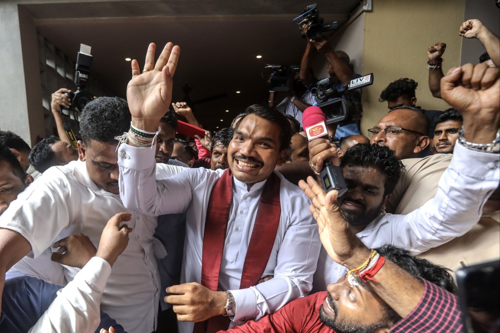 Namal Rajapaksa, son of ex-Sri Lankan president Mahinda Rajapaksa, greets his supporters on August 7 after being nominated by Sri Lanka’s ruling Podujana Peramuna party as their presidential candidate for the upcoming election. Photo: EPA-EFE