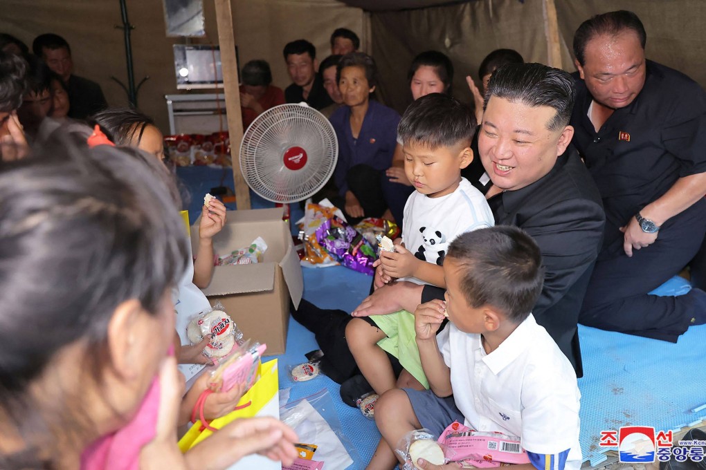 North Korean leader Kim Jong-un visiting the flood-hit area in Uiju County of North Phyongan Province. Photo: KCNA via KNS/ AFP