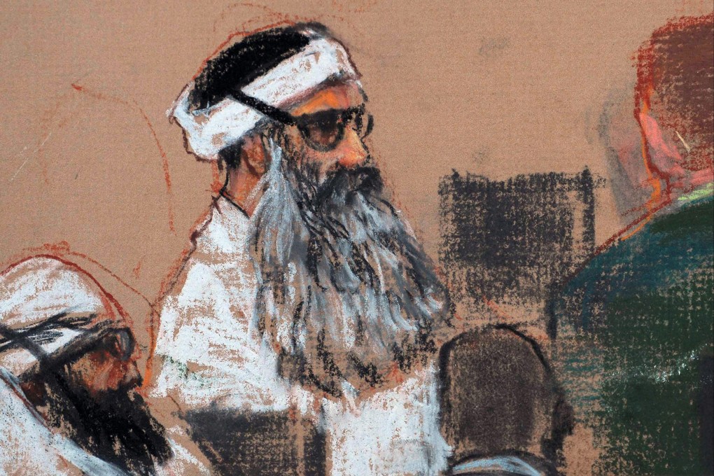 This courtroom drawing by Janet Hamlin from December 8, 2008, shows Khalid Sheikh Mohammed, center, and co-defendant Walid Bin Attash, left, attending a pre-trial session at Guantanamo Bay Naval Base, Cuba. Photo: AP