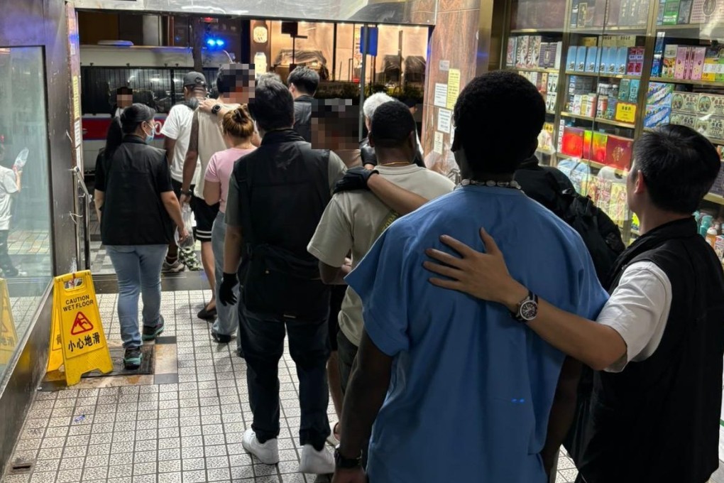 Some of the more than 400 people arrested in a Hong Kong police crackdown on illegal gambling, one of a string of crimebusting operations. Photo: Handout