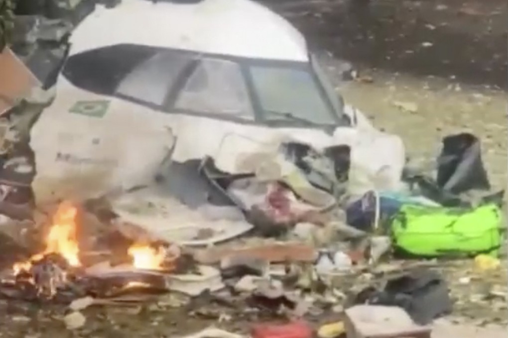 The wreckage from a plane that crashed near a home in Vinhedo is seen in Sao Paulo state, Brazil, on Friday. Photo: Felipe Magalhaes Filho via AP