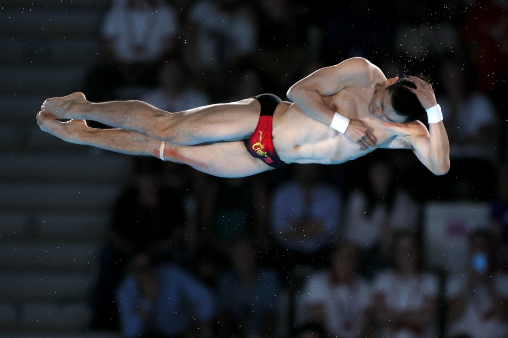 Cao Yuan in action in diving’s men’s 10m platform final. Photo: Reuters