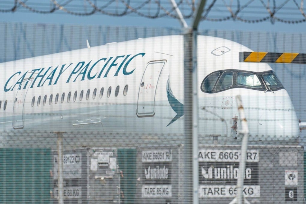 A Cathay aircraft sits at Hong Kong International Airport on August 7. The airline has announced plans to invest more than HK$100 billion by adding more aircraft to its fleet along with other upgrades. Photo: Bloomberg
