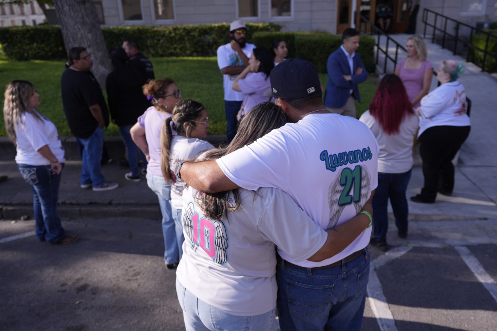 Families of the victims in the Uvalde school shooting file out of the Uvalde County Courthouse where police officer Adrian Gonzales appeared in July to face charges of abandoning and failing to protect children. Photo: AP