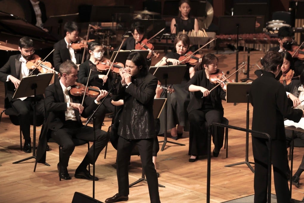 Harmonica player Cy Leo performs with the Hong Kong Sinfonietta on August 10, 2024, at the Hong Kong City Hall Concert Hall. Photo: HK Sinfonietta Ltd