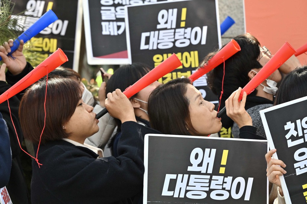 South Korean protesters hold a rally against Seoul’s announcement of plans to compensate victims of Japan’s forced wartime labour, outside the foreign ministry in March 2023. Photo: AFP