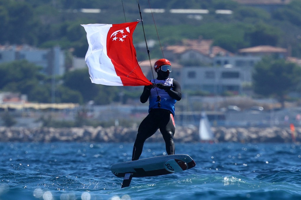 Singapore’s Maximilian Maeder celebrates winning the bronze medal in kitefoiling at the Paris 2024 Olympics. Photo: Reuters