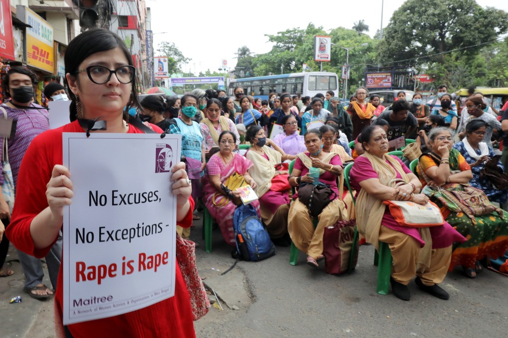 People attend a rally denouncing violence against women in Kolkata in 2022. Photo: EPA-EFE