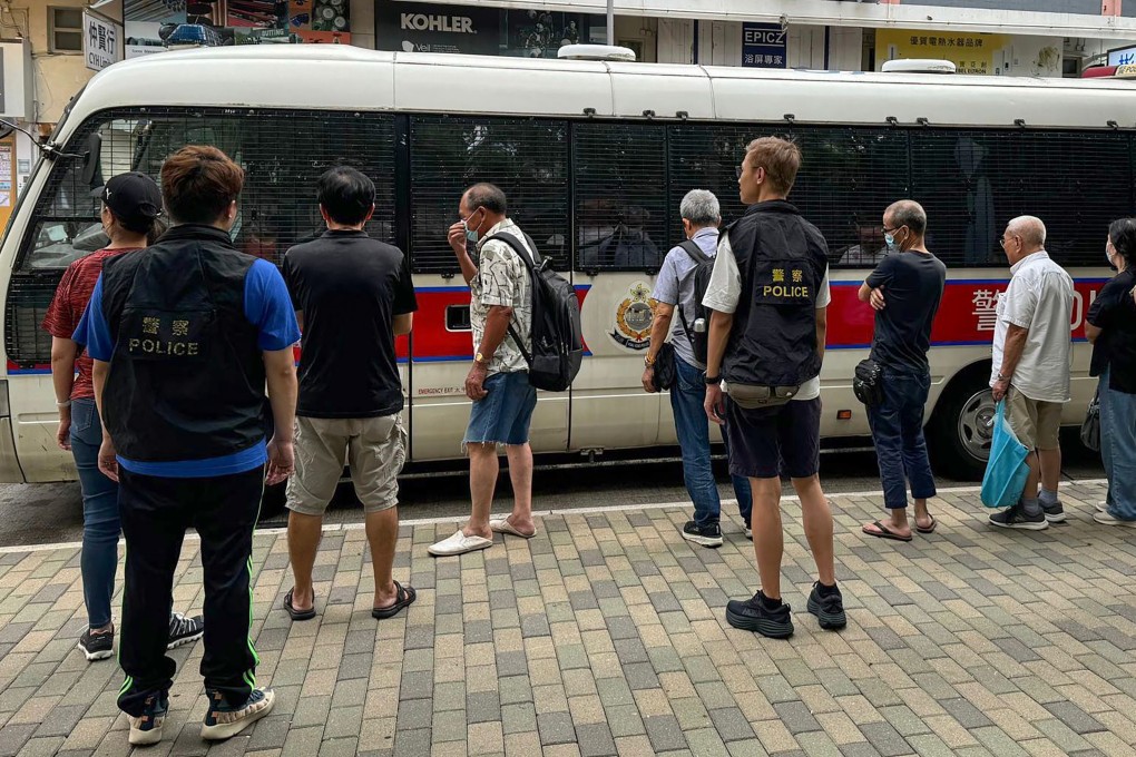 Police arrests a group of people, one aged 90, after an anti-gambling raid last week. Photo: Hong Kong Police