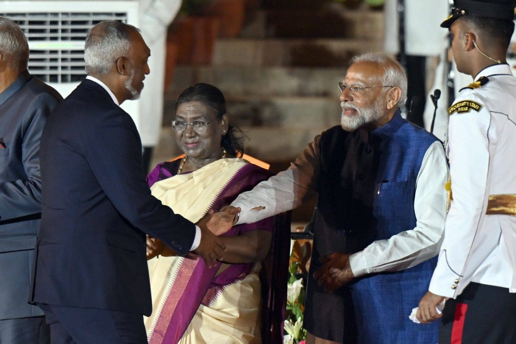 India’s Prime Minister Narendra Modi shakes hands with the Maldives’ President Mohamed Muizzu during his swearing-in ceremony in New Delhi on June 9, 2024. Photo: Bloomberg