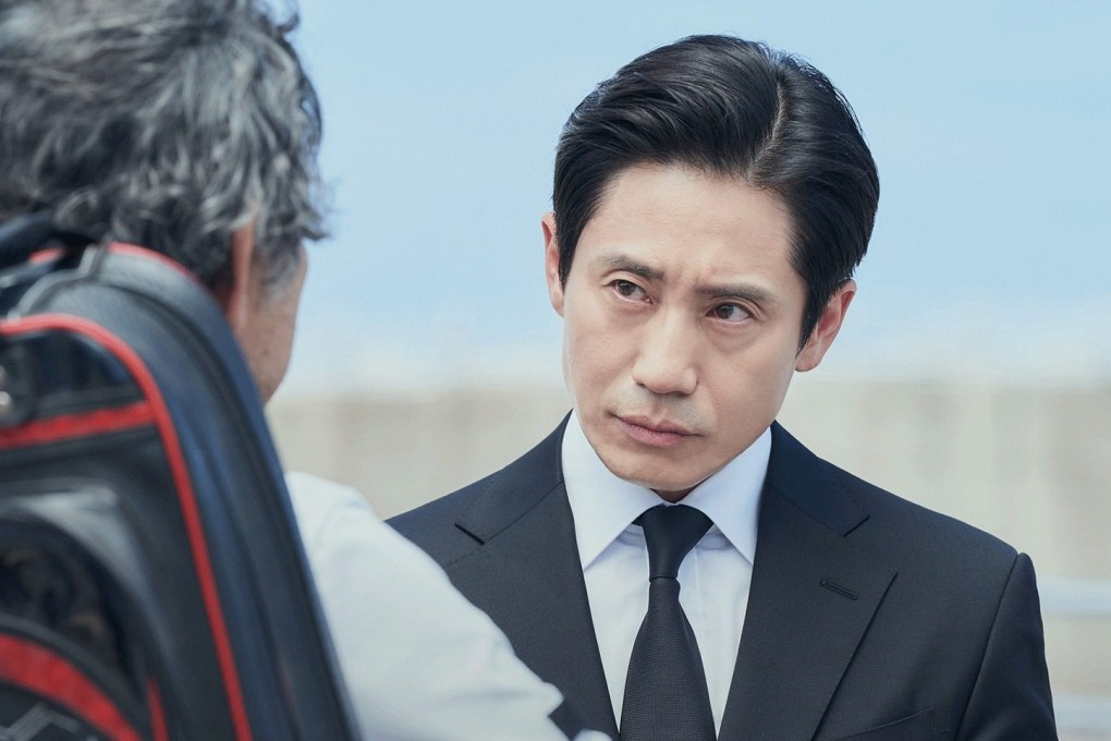 Shin Ha-kyun as audit chief Shin Cha-il in a still from K-drama The Auditors. Lee Jung-ha and Jin Goo co-star.