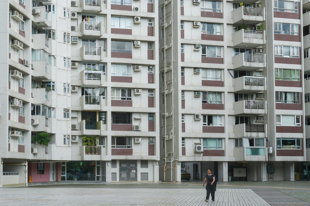 Authorities in 2018 and 2019 ordered owners of 876 flats at the Braemar Hill Mansions in North Point to demolish illegal structures attached to the external wall next to the kitchen. Photo: Sam Tsang
