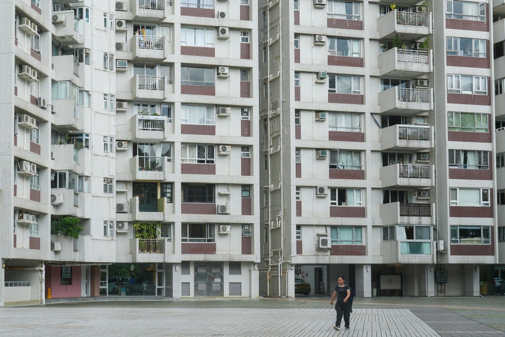 Authorities in 2018 and 2019 ordered owners of 876 flats at the Braemar Hill Mansions in North Point to demolish illegal structures attached to the external wall next to the kitchen. Photo: Sam Tsang