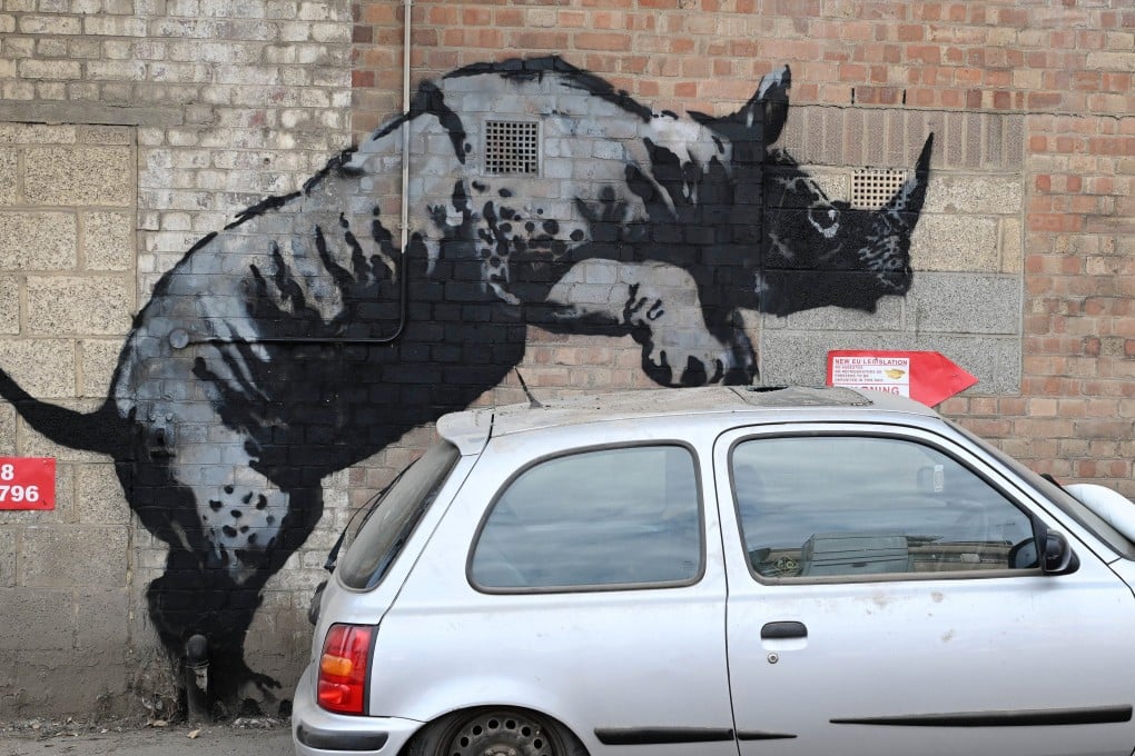 A new animal-themed artwork by Britain-based street artist Banksy featuring a rhino on a wall. Photo: EPA-EFE