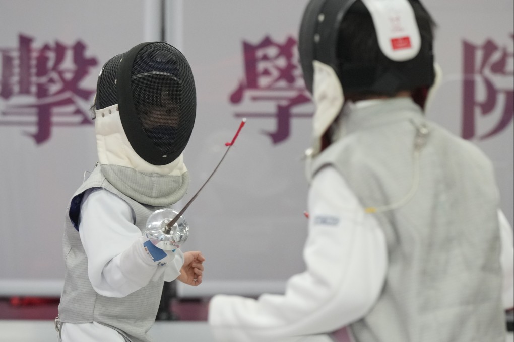 Boys practice at a fencing school in Jordan, Hong Kong, on August 1. The success of Hong Kong fencers at the Olympics has boosted interest in the sport in the city. Photo: May Tse