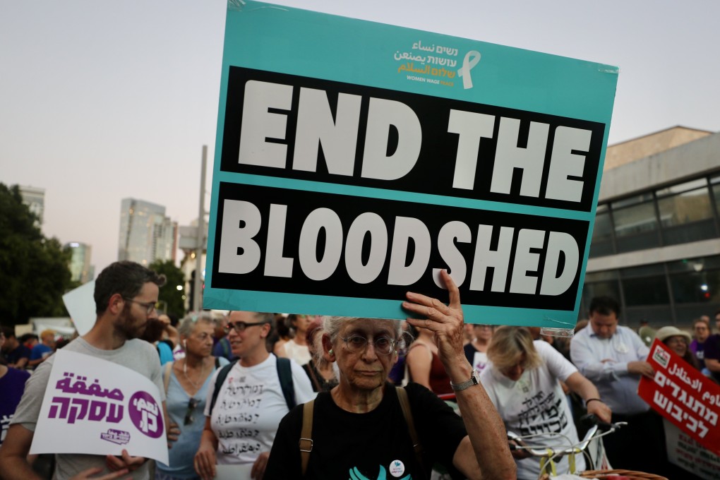 People take part in a demonstration in demand of an immediate ceasefire in Gaza and a deal for the release of the remaining hostages held by Hamas in Tel Aviv, Israel, on July 25. Photo: Xinhua