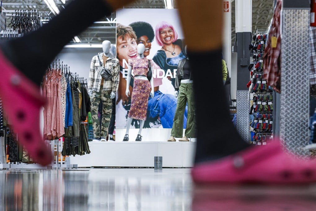 A customer walks by No Boundaries merchandise at a Walmart Superstore in Secaucus, New Jersey, on July 11. In the hope of resonating with younger members of Generation Z, Walmart has revamped its 30-year-old brand for teenagers and young adults. Photo: AP