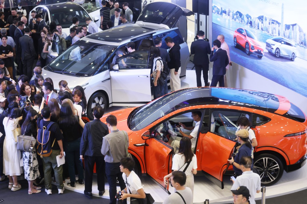 Crowds throng Ocean Terminal in Tsim Sha Tsui to take a look at the Xpeng electric cars during their launch in May. Photo: Jonathan Wong