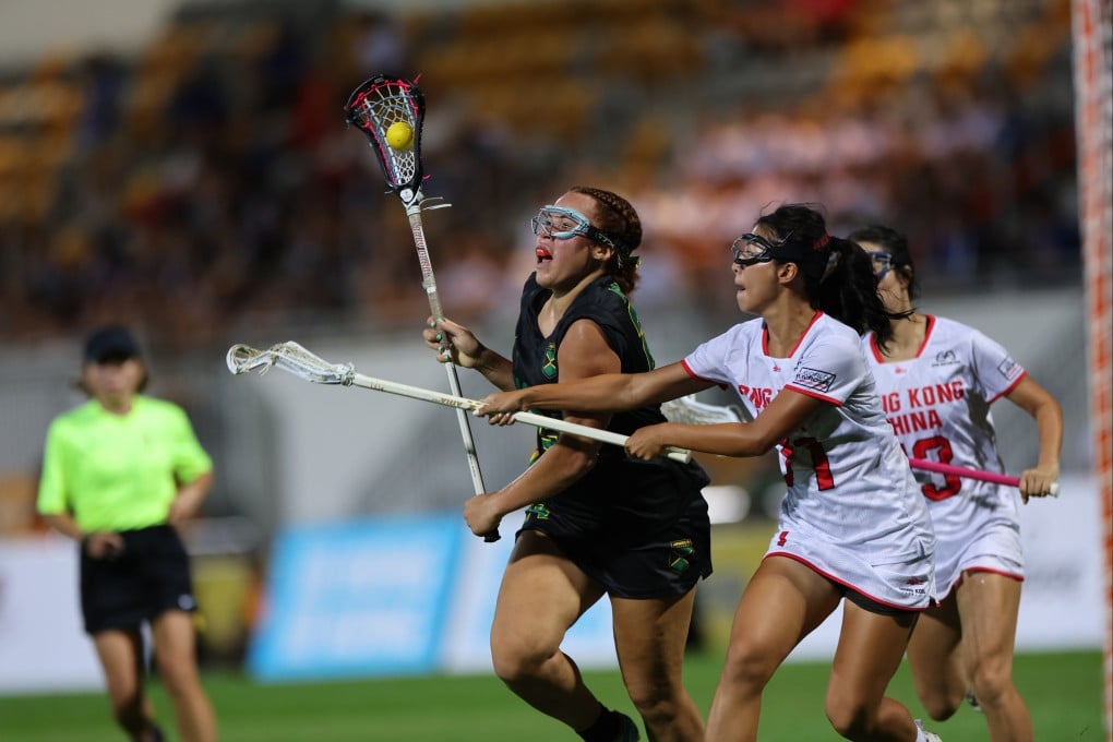 Jamaica’s Makayla Mitchell vies with Alexias Yip of Hong Kong at Mong Kok Stadium. Photo: Dickson Lee
