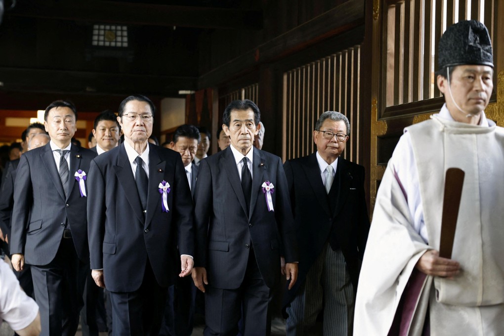 Japanese lawmakers visit Yasukuni shrine. Photo: Kyodo/via Reuters
