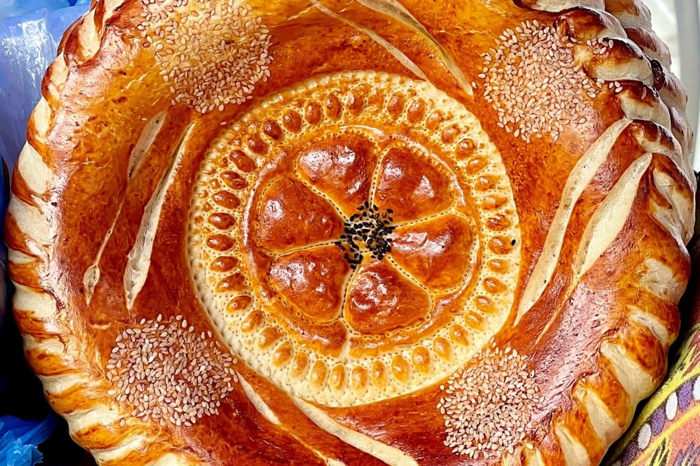 A loaf of bread - known as “non” in Uzbekistan - with intricate designs baked in the artistic style of the country’s Fergana Valley. Photo: Anne Pinto-Rodrigues