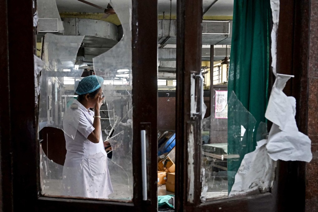 A nurse looks at an emergency ward of R.G. Kar Medical College and Hospital after it was vandalised in Kolkata on Thursday. Photo: AFP