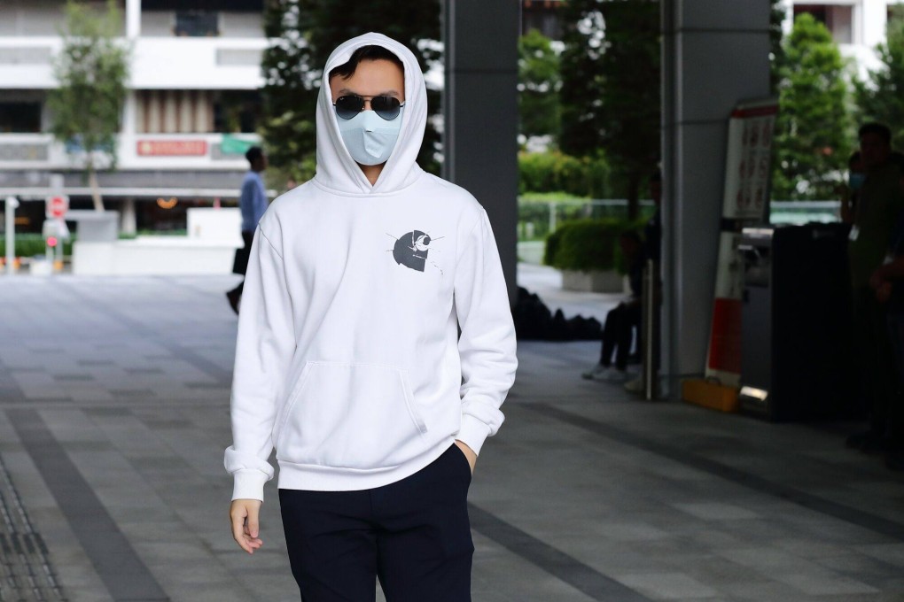 Former Citibank employee Wang Qiming leaves the State Courts in Singapore on Thursday. Photo: Bloomberg