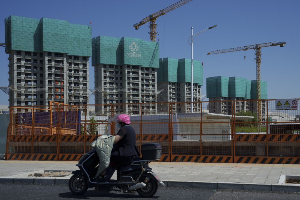 China’s overall fixed-asset investments, which include property spending, rose by 3.6 per cent in the first seven months of the year. Photo: AP