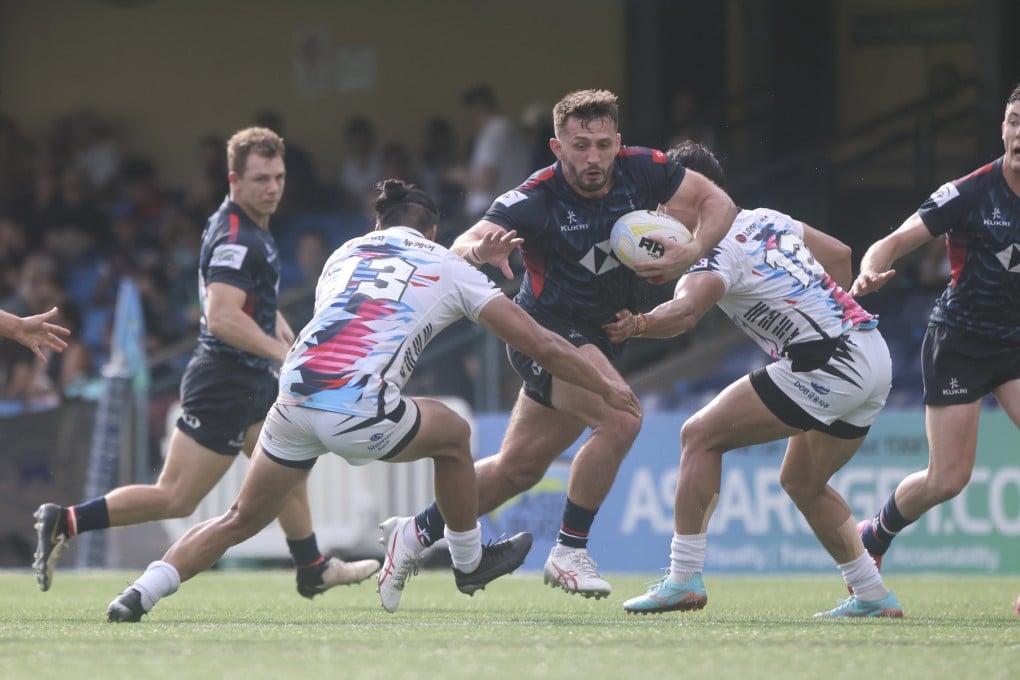 Hong Kong’s Ben Axten-Burrett in possession against South Korea in this year’s Asia Rugby Championship. Photo: Jonathan Wong