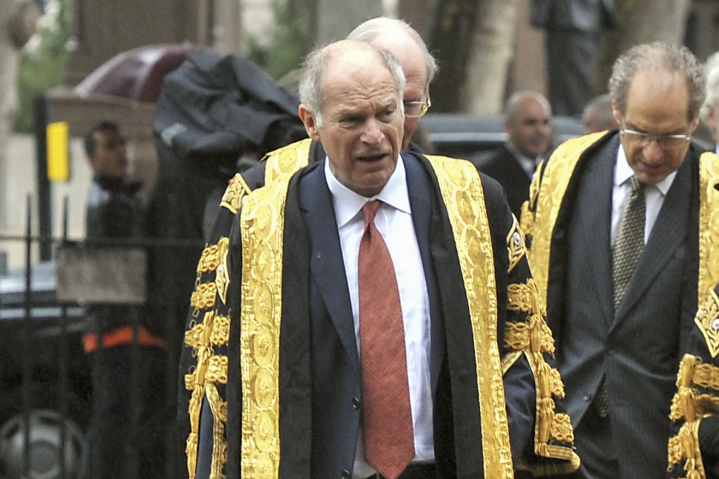 David Neuberger (red tie) cited unspecified “concerns” about his concurrent position as a non-permanent judge at Hong Kong’s Court of Final Appeal in explaining his departure from the panel. Photo: Getty Images