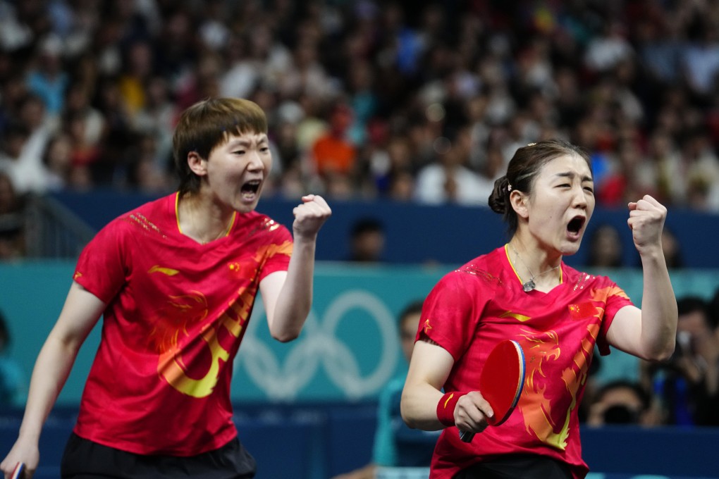 China’s Chen Meng (right) and Wang Manyu react after a winning set against Japan’s Miwa Harimtoto and Hina Hayata during the women’s gold medal team table tennis match at the Paris Olympics on August 10. Photo: AP