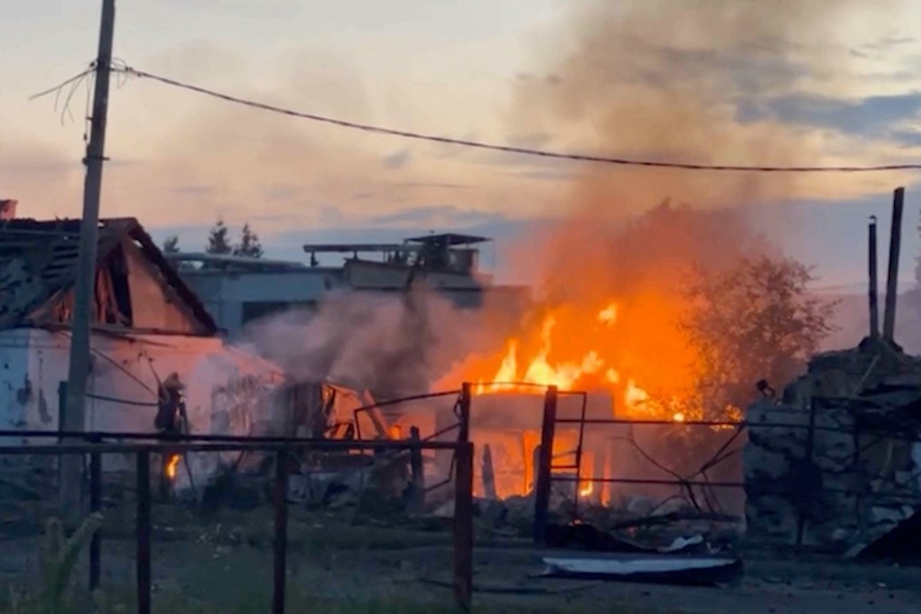 Buildings on fire are seen in the Russian town of Sudzha on August 7. Photo: MIC Izvestia/IZ.RU via Reuters