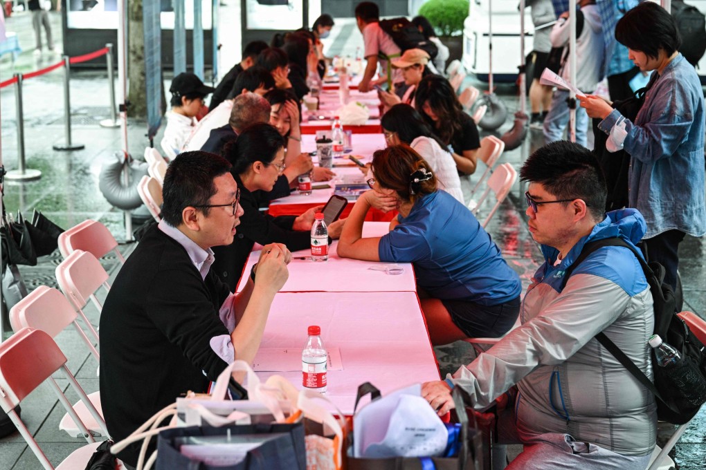 People visit a job fair in in Shanghai on May 31. An estimated 1.2 billion young people in the Global South will become working-age adults in the next 10 years, yet there will not be nearly enough jobs for them without bold and urgent reforms. Photo: AFP