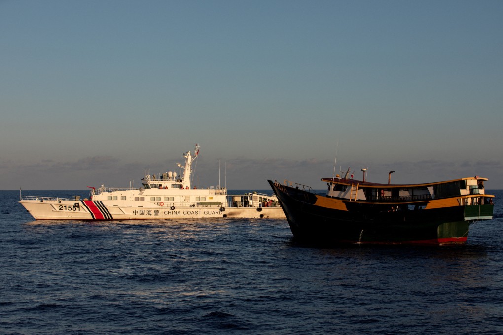 A Chinese coastguard vessel blocks a Philippine resupply vessel on its way to a resupply mission at the Second Thomas Shoal in the South China Sea in March. Photo: Reuters
