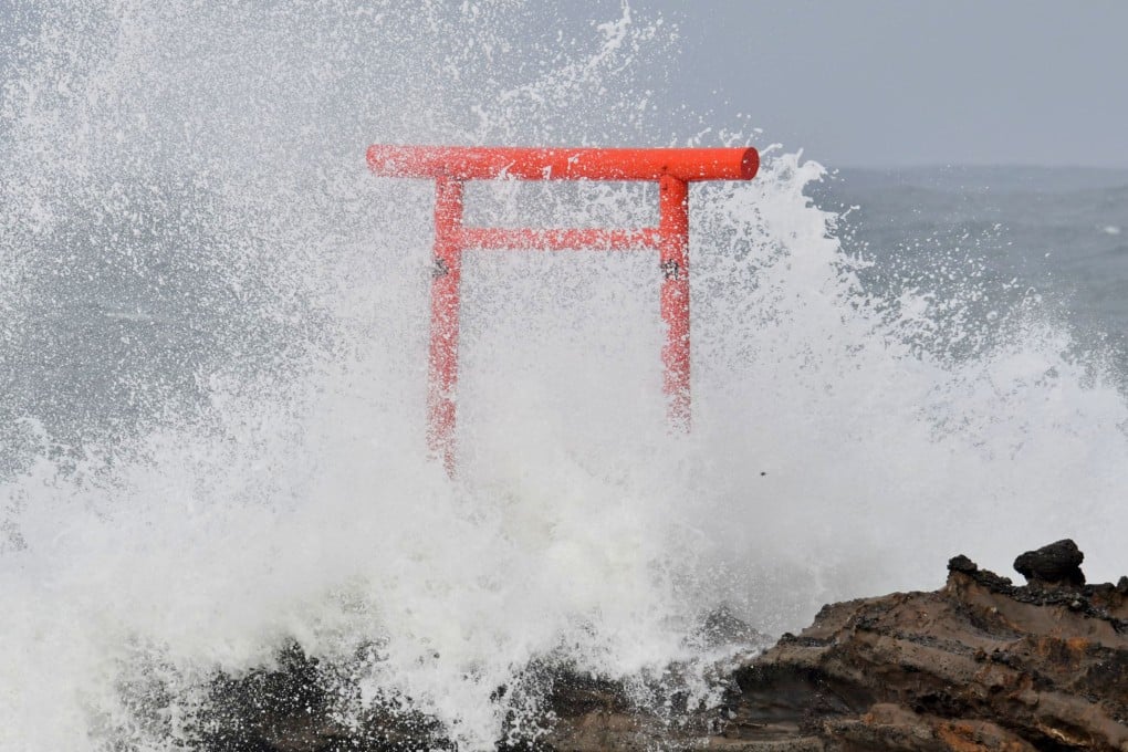 High waves pound a “trii” gate standing off the shore in Iwaki in the northeastern Japan prefecture of Fukushima on August 16 due to Typhoon Ampil. Photo: Kyodo