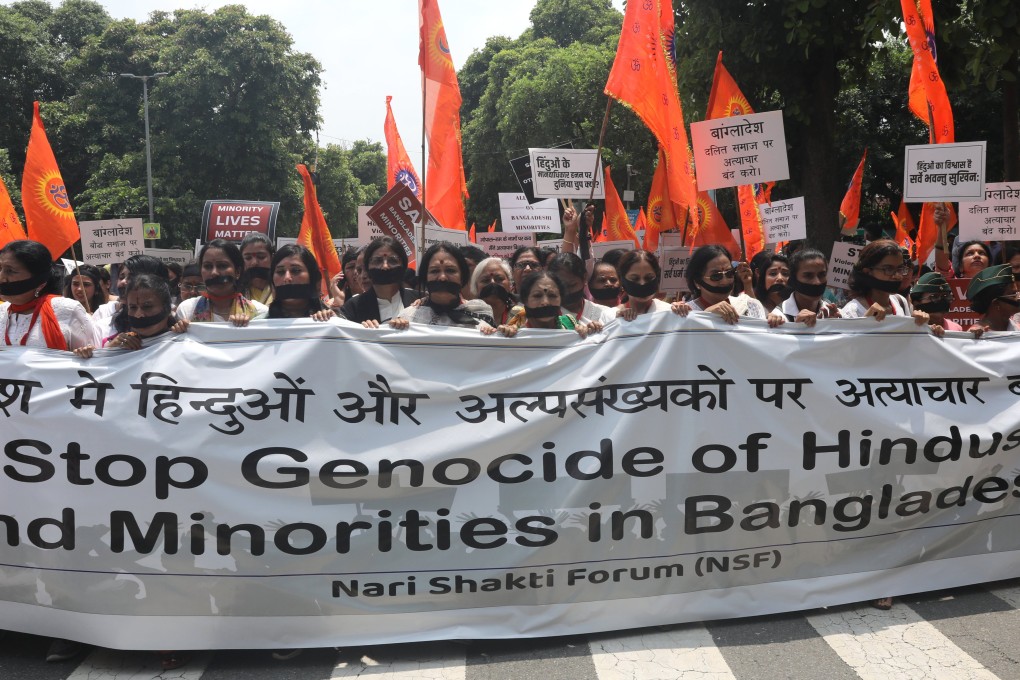 Members of the Nari Shakti Forum and their supporters take part in a protest march against alleged atrocities on Bangladeshi Hindus and other minorities, in New Delhi on Friday. Photo: EPA-EFE