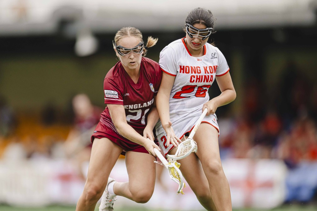 Hong Kong’s Ada Kurumlu (right) vies with Rachael Ball of England at Hong Kong Football Club. Photo: HKLAX