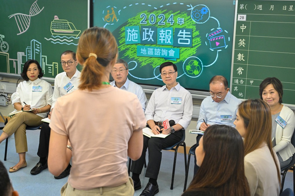 A resident addresses Chief executive John Lee at the public forum on Sunday. Photo: Handout
