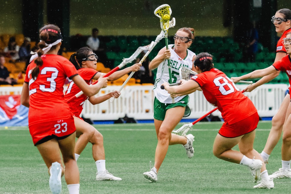 Ireland’s Bridget Valentine, who scored four goals, tries to breach Hong Kong’s defence. Photo: HKLAX