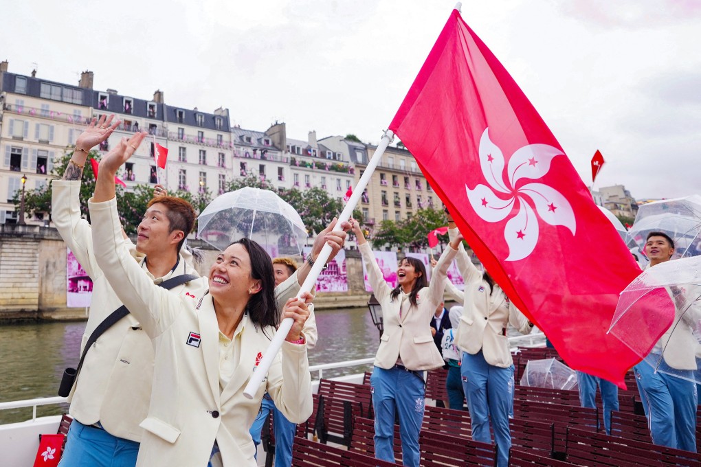 Members of the Hong Kong delegation wave to fans at the opening ceremony of the Paris Olympic Games earlier this month. Photo: Reuters