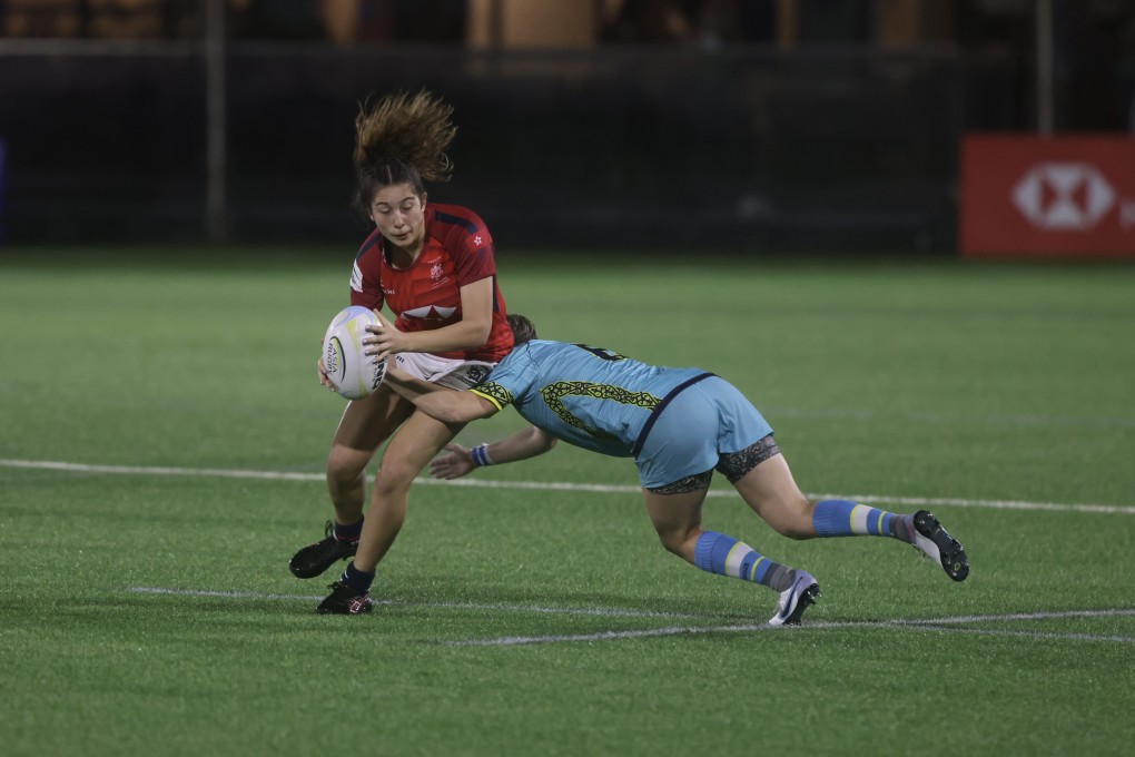 Hong Kong fly-half Georgia Rivers (left) is tackled by Kazhakstan’s Mariya Grishina during their Asia Rugby Championship game in June. Photo: Jonathan Wong