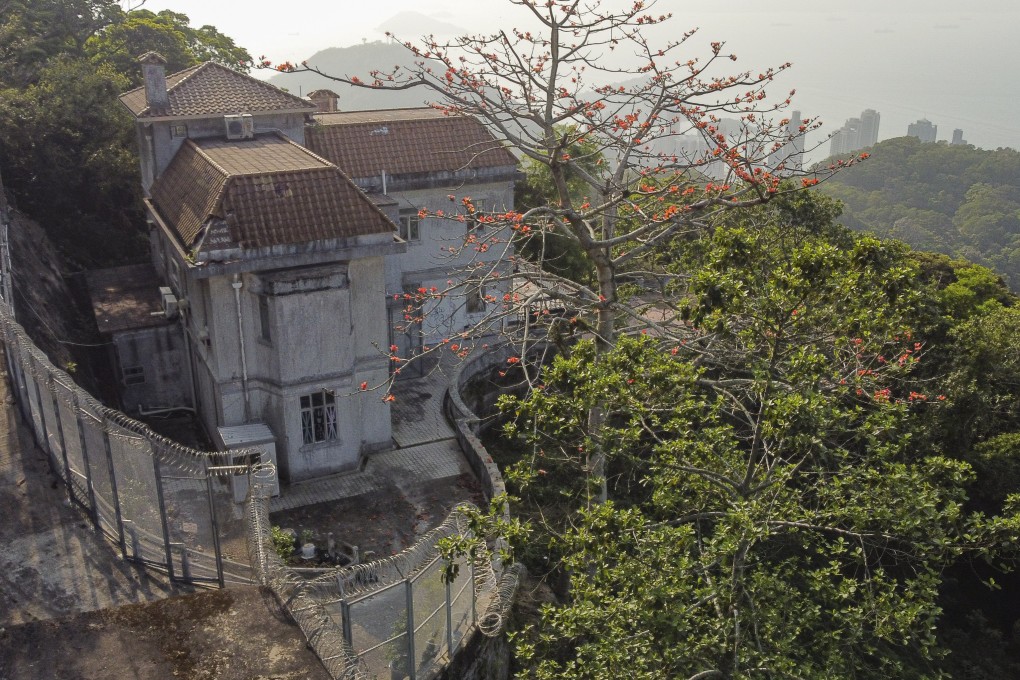 A view of the supposedly haunted Dragon Lodge on The Peak in Hong Kong. The stigma attached to living in a place where an unnatural death occurred makes it hard to rent or sell them, although deep discounts can work. Photo: Martin Chan