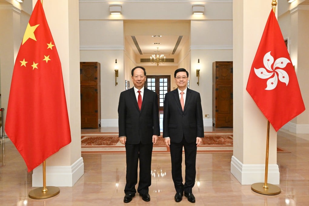 Shi Taifeng (left), director of Beijing’s United Front Work Department, held a closed-door meeting with Chief Executive John Lee Ka-chiu at the Government House on Monday. Photo: Handout