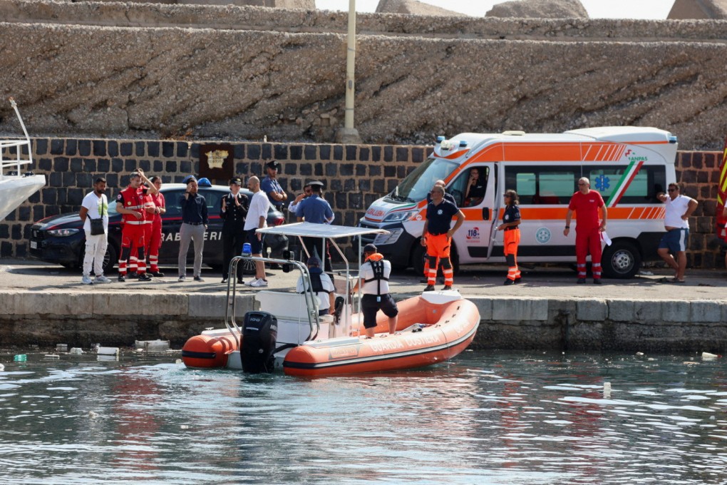 Emergency and rescue services work near the scene where a luxury yacht sank in the early hours of Monday, off the coast of Porticello, near the Sicilian city of Palermo, Italy. Photo: Reuters