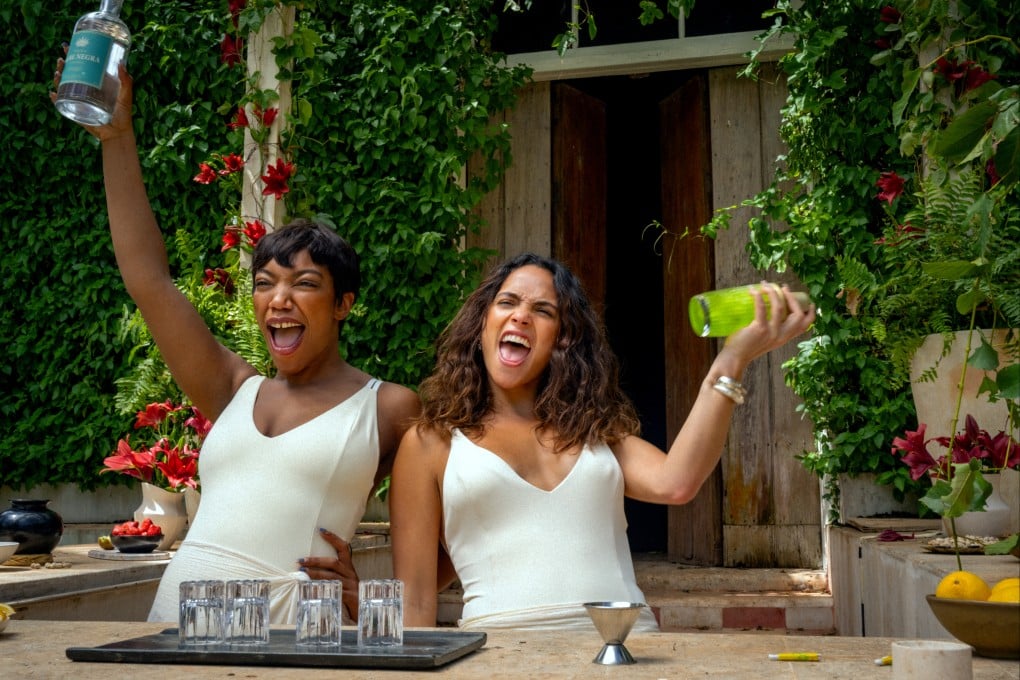 Naomi Ackie (left) as Frida and Adria Arjona as Sarah in a still from Blink Twice. Photo: Carlos Somonte/Amazon Content Services LLC
