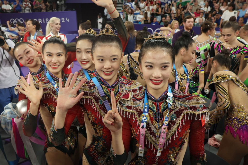 Members of the Chinese gymnastics team wave at the Olympic Games in Paris. Photo:  Xinhua