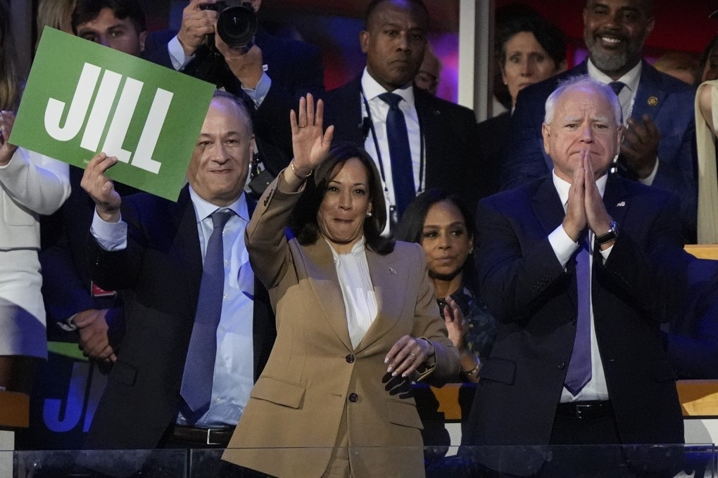 Democratic presidential nominee and current US Vice-President Kamala Harris, centre, and vice-presidential nominee Minnesota Governor Tim Walz, right, listen to First Lady Jill Biden speak during the Democratic National Convention in Chicago on August 19. Photo: AP